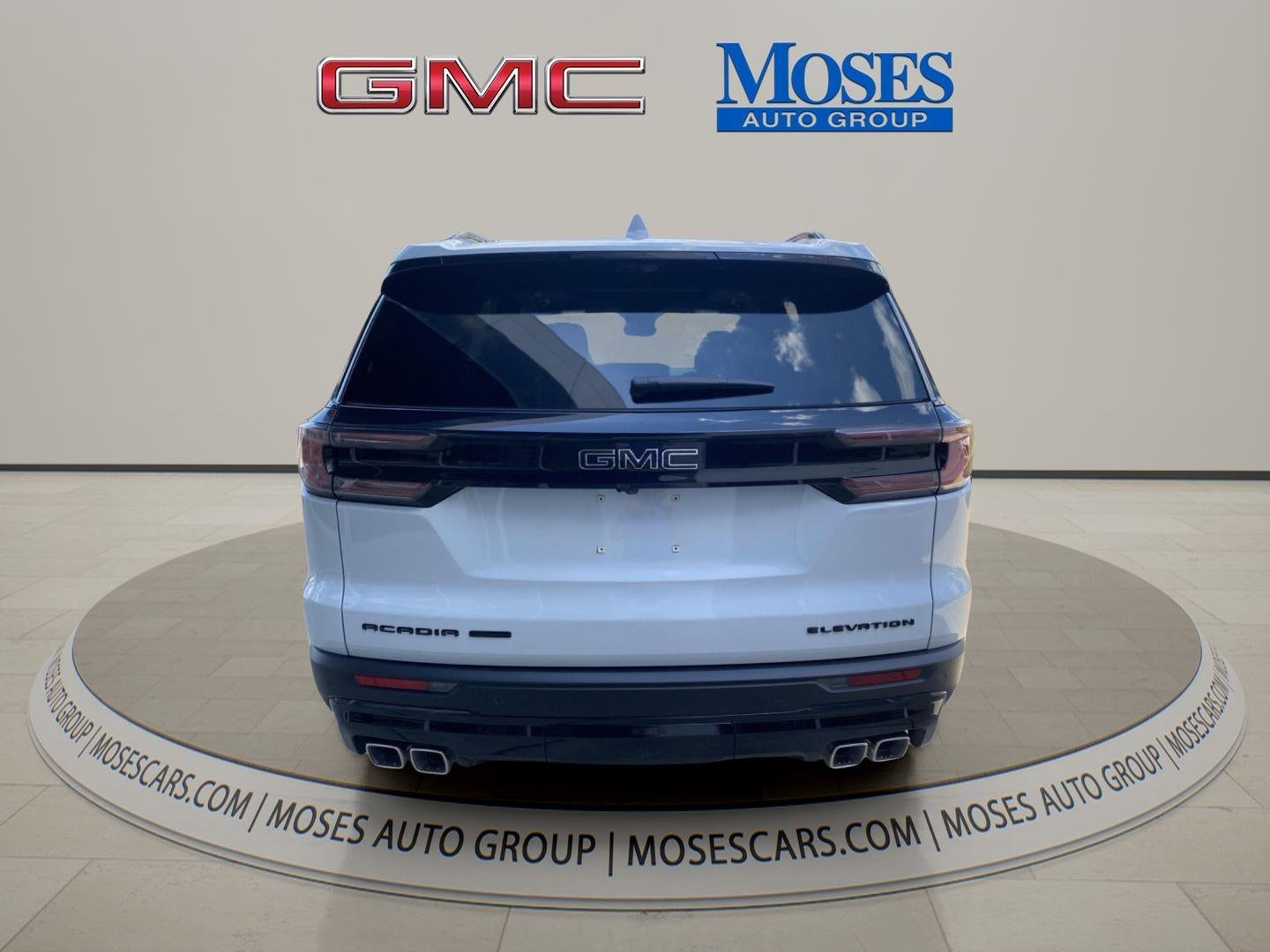 2026 GMC Acadia Elevation in Glacier White Tricoat — front three-quarter view