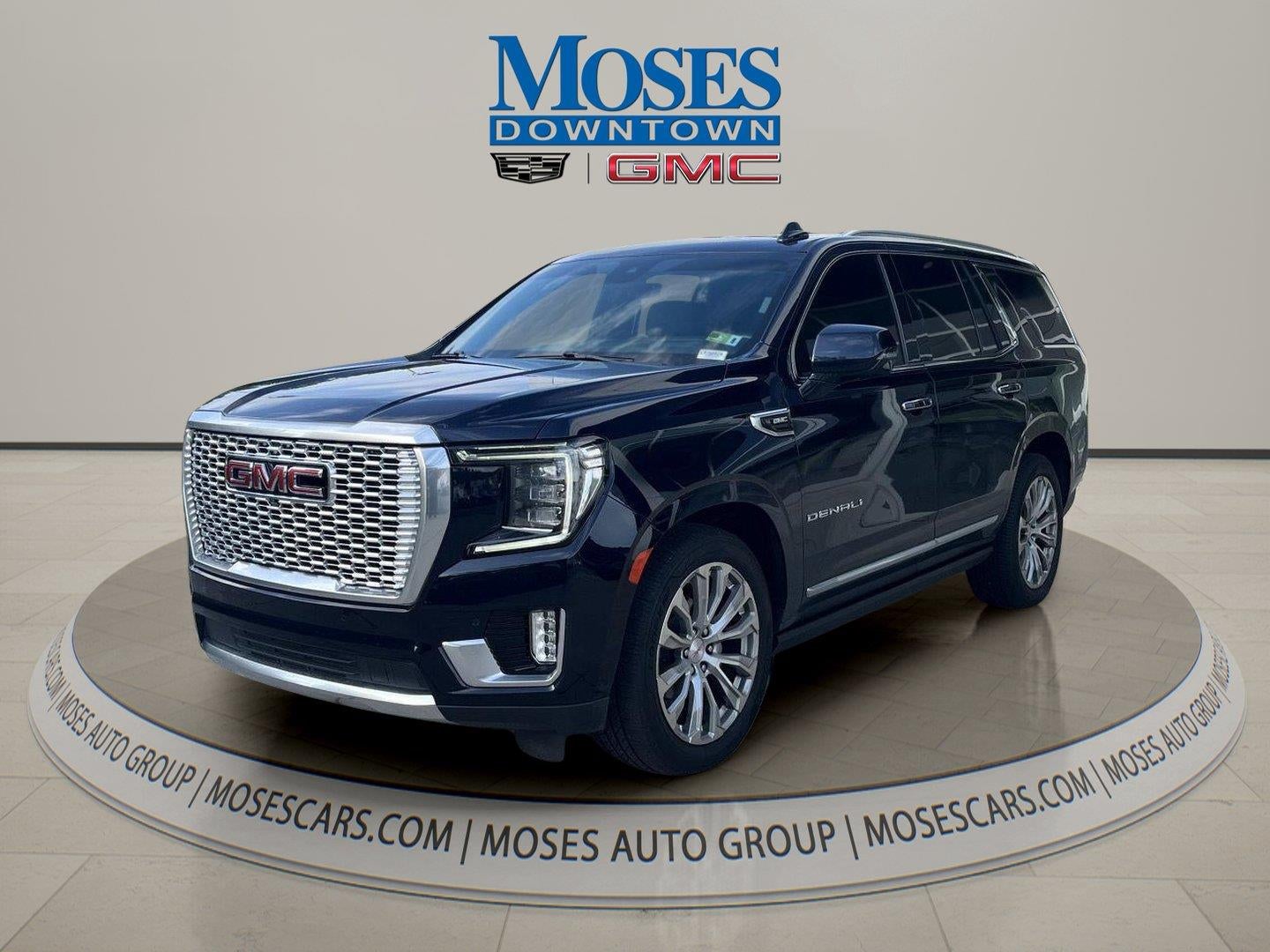 2024 GMC Yukon Denali in Midnight Blue Metallic — front three-quarter view