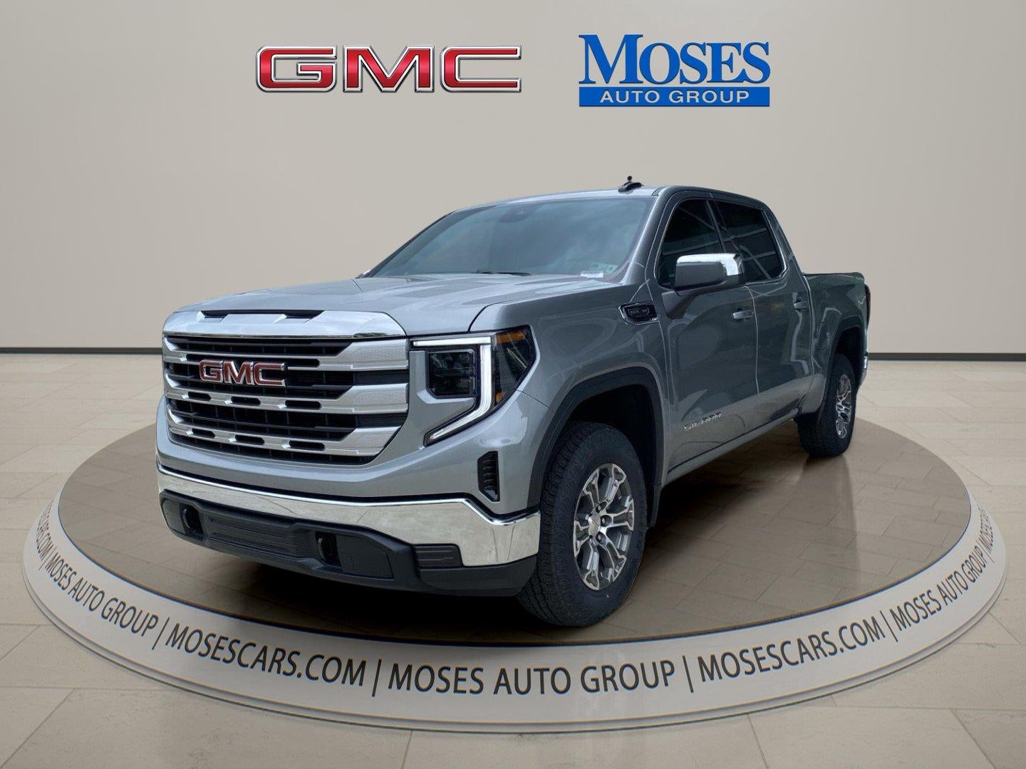 2026 GMC Sierra 1500 SLE in Sterling Metallic — front three-quarter view