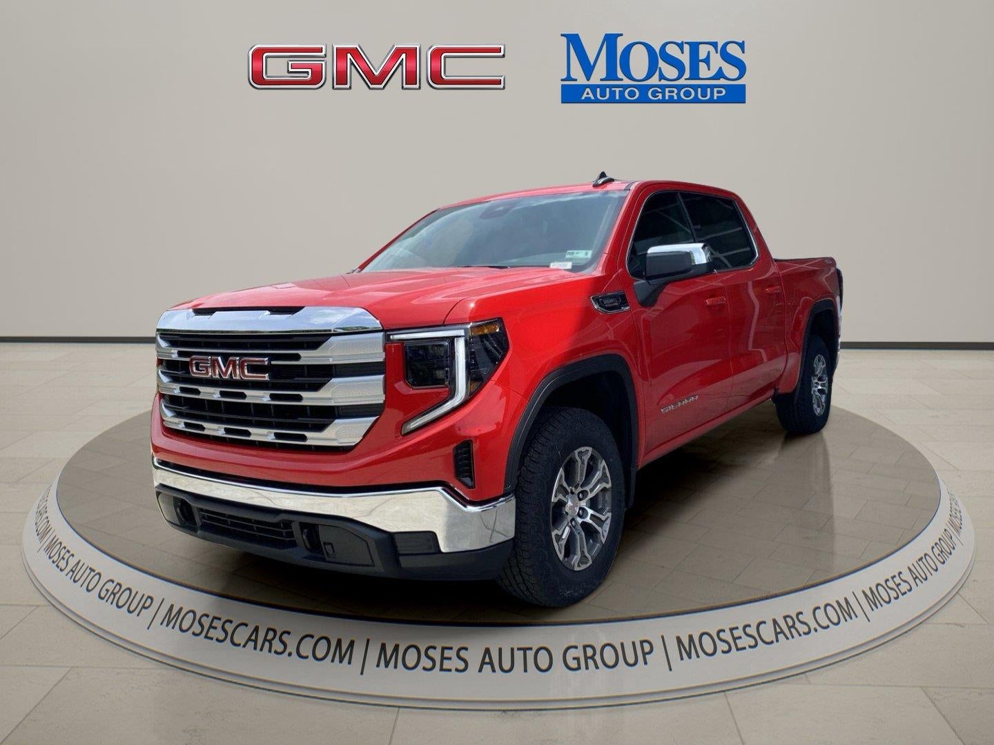 2026 GMC Sierra 1500 SLE in Cardinal Red — front three-quarter view