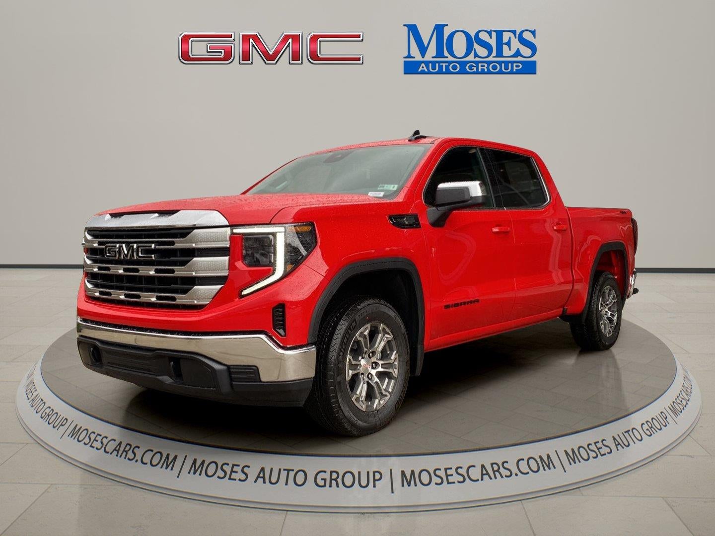 2026 GMC Sierra 1500 SLE in Cardinal Red — front three-quarter view