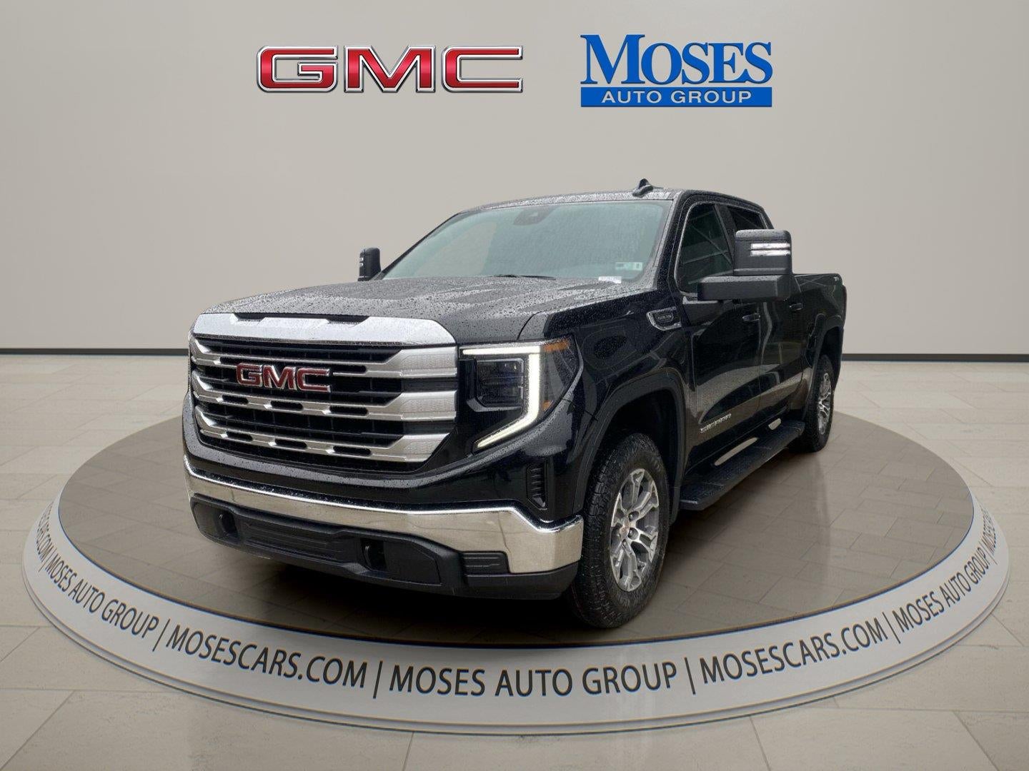 2026 GMC Sierra 1500 SLE in Onyx Black — front three-quarter view