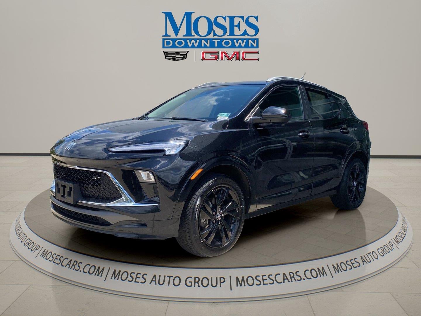 2024 Buick Encore GX Sport Touring in Ebony Twilight Metallic — front three-quarter view
