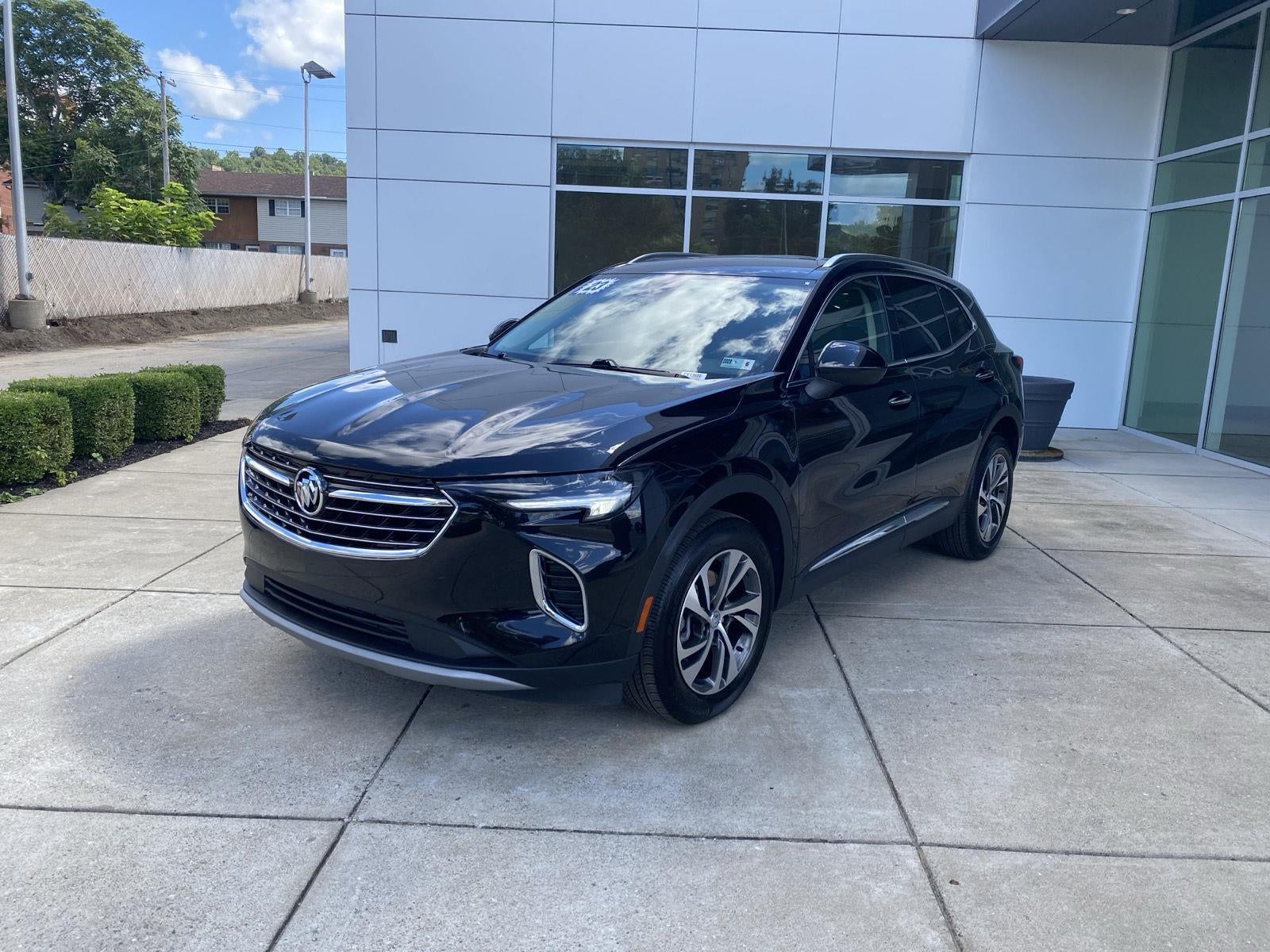 2023 Buick Envision Essence in Ebony Twilight Metallic — front three-quarter view